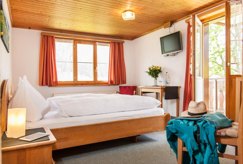 Schwendi Lodge Unterwasser Pokoj fotografie